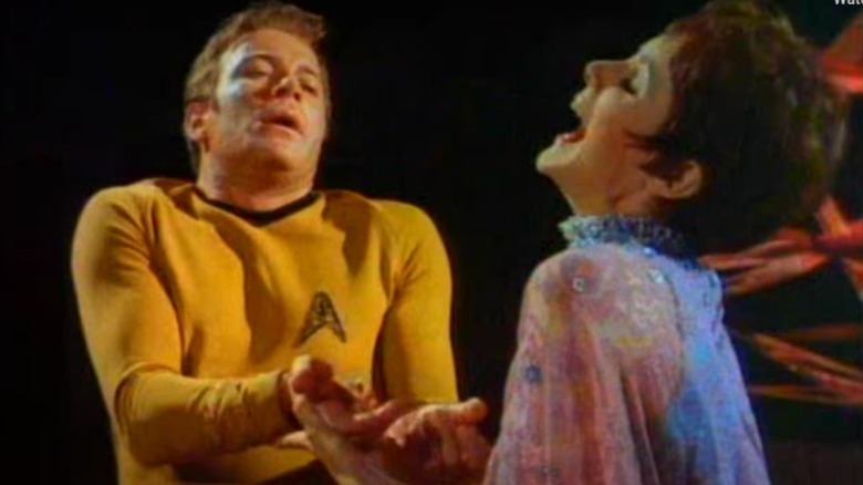 Captain Kirk touching the empath