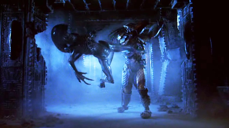 A Predator throws a Xenomorph in "Alien vs. Predator" (2004)