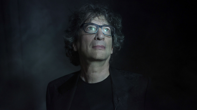 Neil Gaiman shrouded in smoke