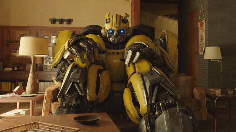 Bumblebee sitting on a couch in "Bumblebee"