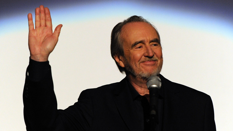 Wes Craven waving his hand