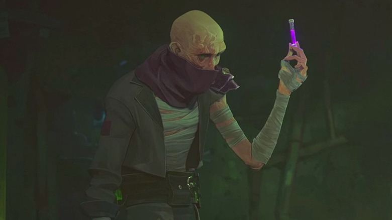 Singed holding a vial 