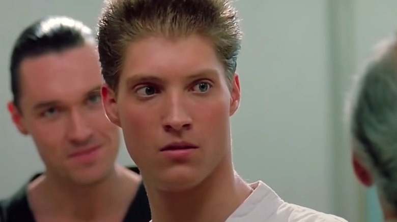 Thomas Ian Griffith and Sean Kanan talking in The Karate Kid Part III