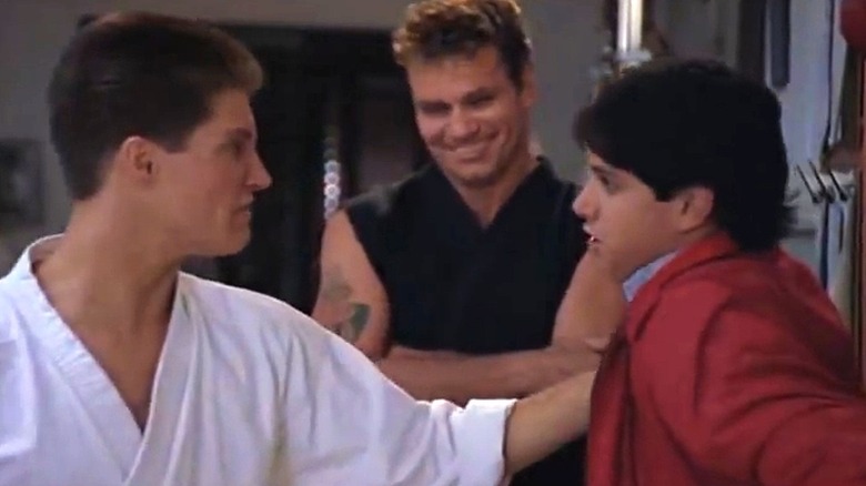 Sean Kanan, Martin Kove and Ralph Macchio talking in The Karate Kid Part III