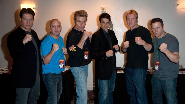 Sean Kanan, Ron Thomas, Martin Kove, Ralph Macchio, William Zabka and Tony O'Dell posing