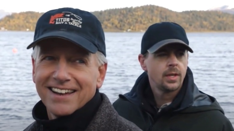 Gibbs smiling with McGee in front of water