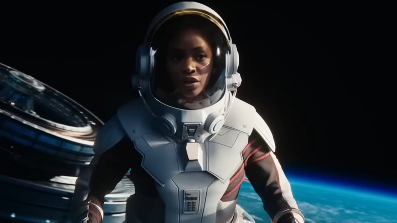 Monica Rambeau wearing a space suit