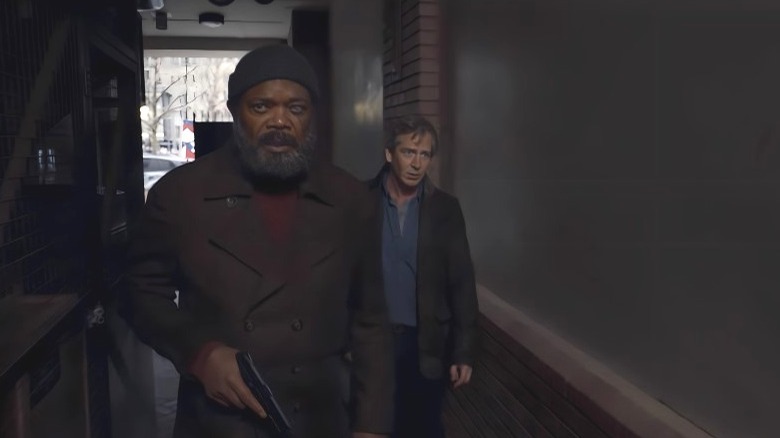 Nick Fury and Talos walking in a hall