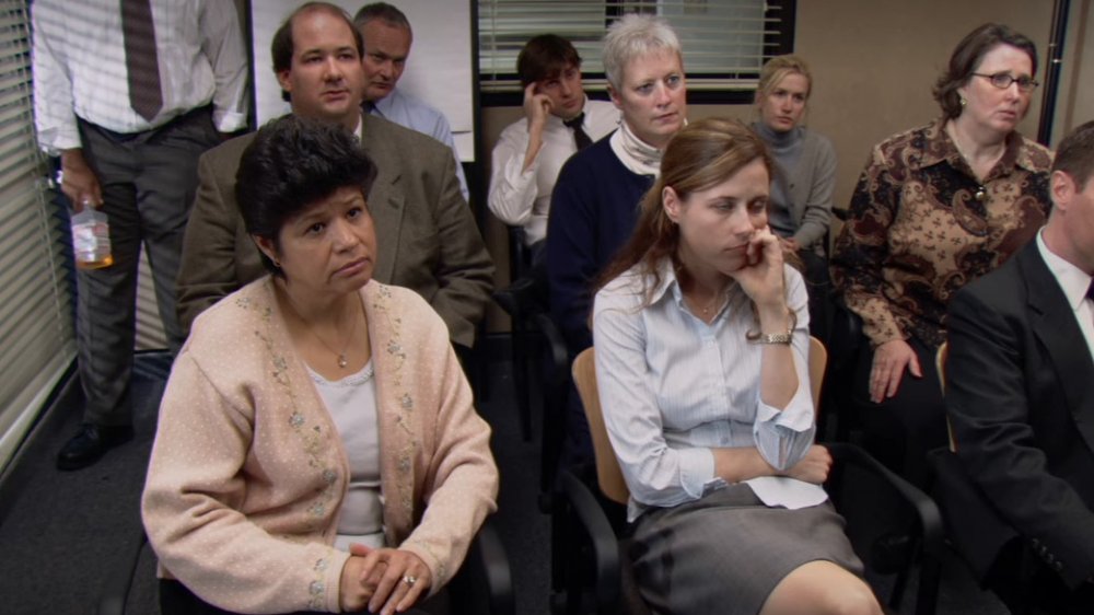 The cast of The Office in the conference room, from The Office's pilot