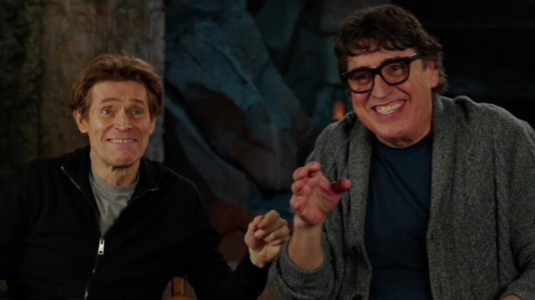 Willem Dafoe and Alfred Molina laughing