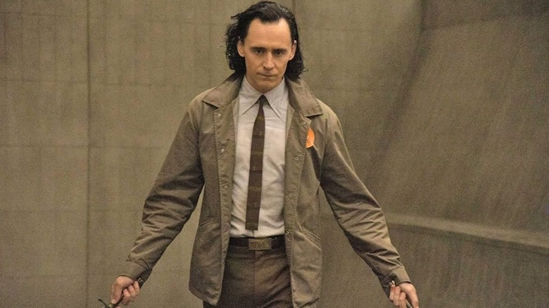 Loki wearing a TVA uniform in Loki