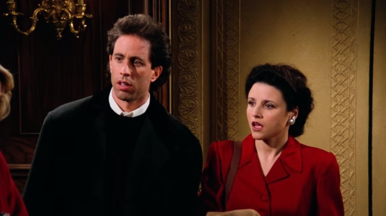 Jerry and Elaine standing next to each other