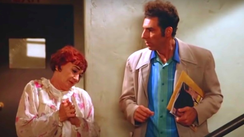 Kramer talks to a neighbor