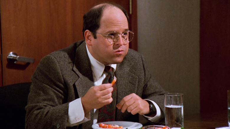 George Costanza eating shrimp