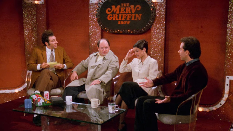 Kramer interviewing George, Elaine, and Jerry