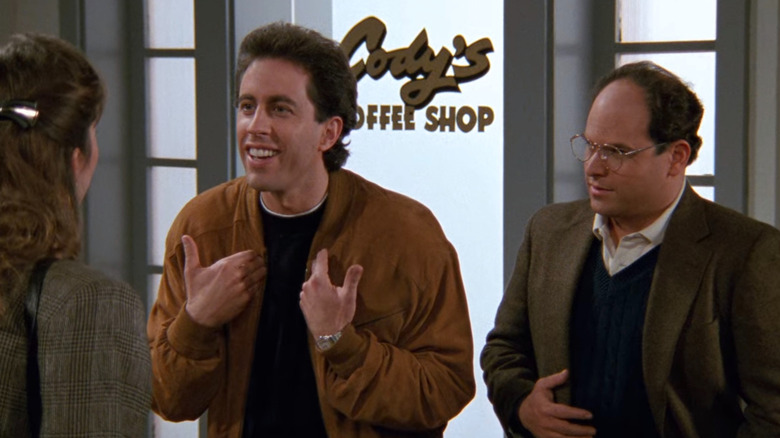 Jerry Seinfeld pointing at himself 