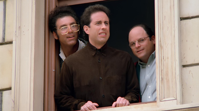 Kramer, Jerry, and George looking out the window