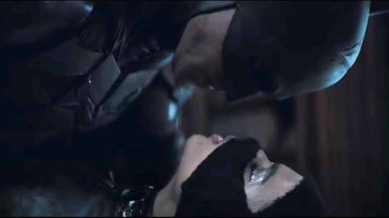 Batman pins down Catwoman