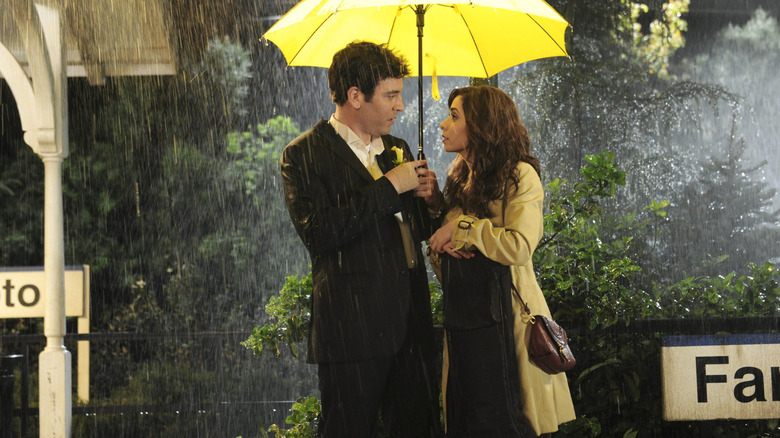 Ted and Tracy under umbrella