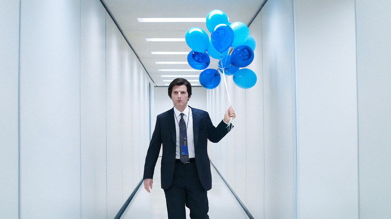 Adam Scott holding balloons