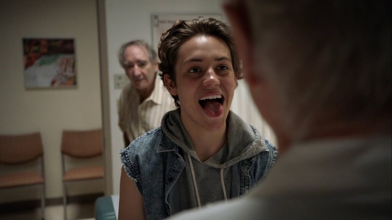 Carl Gallagher sticking his tongue out