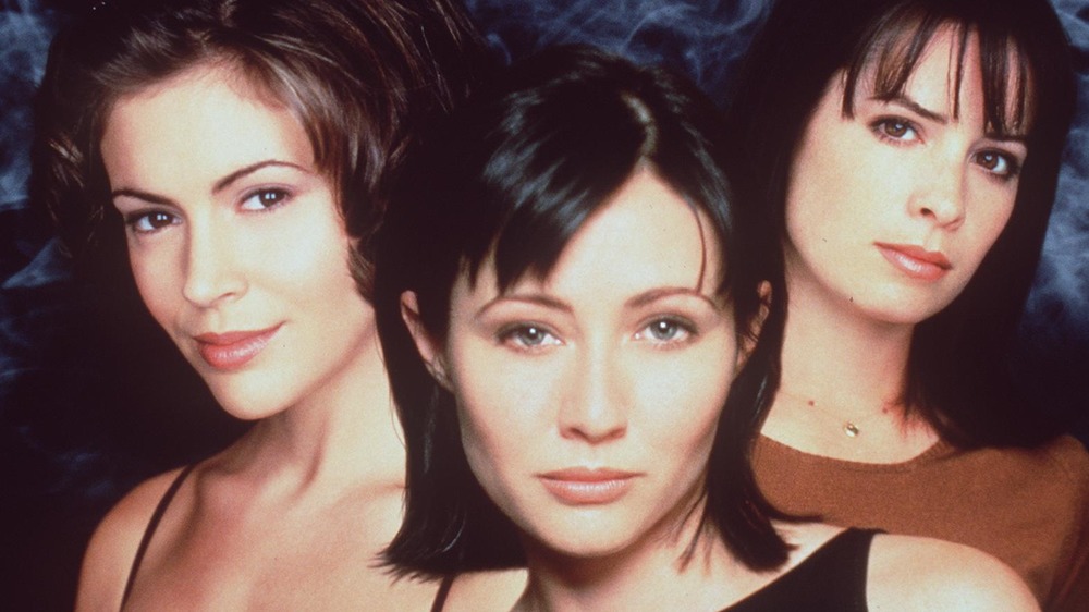 Shannen Doherty, Holly Marie Combs, and Alyssa Milano in promo art for Charmed