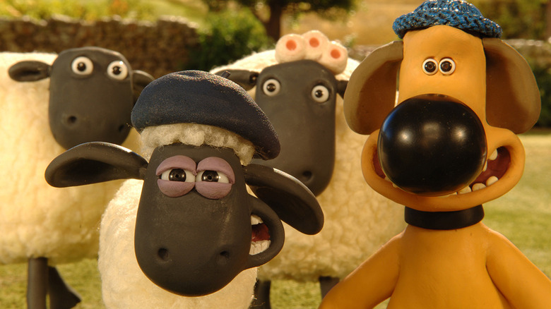 Shaun and Blitzer with sheep