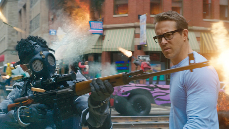 Ryan Reynolds as Guy wearing glasses in Free Guy