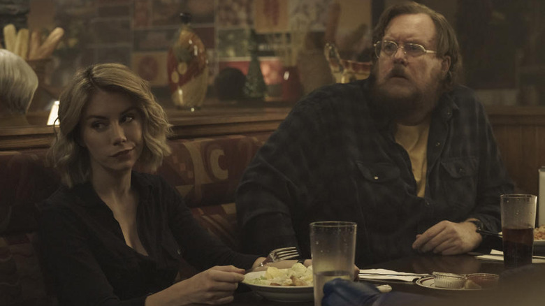  Emilia Harcourt and John Economos sitting at diner