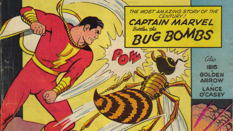 Captain Marvel decking a giant wasp