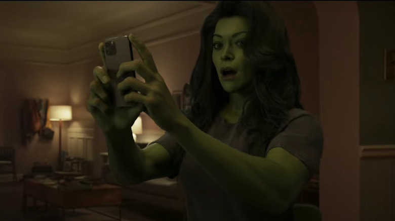 She-Hulk looks stunned at her phone