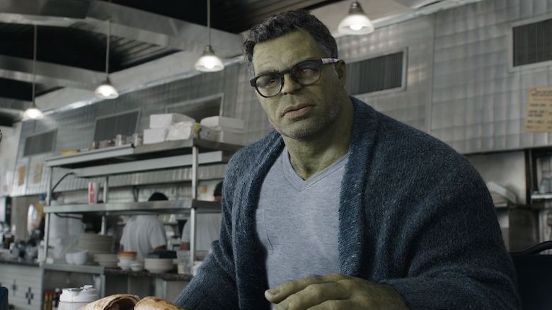 Hulk in a diner wearing a cardigan