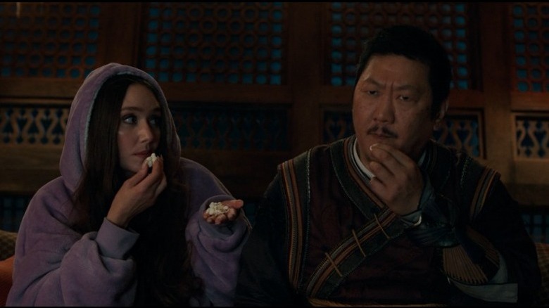 Wong and Madisynn eating popcorn