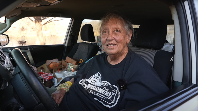 Shelley Duvall in cluttered car