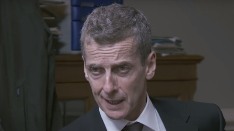 Peter Capaldi with smug expression