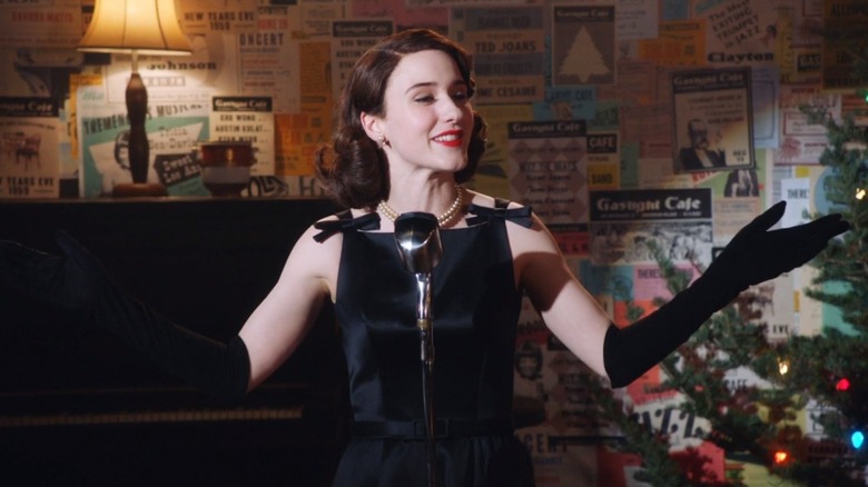 Midge Maisel performing black dress