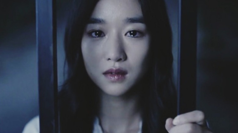 Sang-mi behind bars