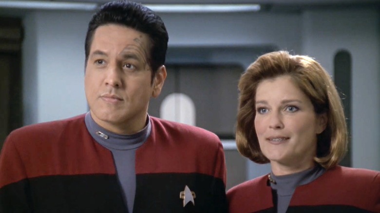 Chakotay and Janeway listen 