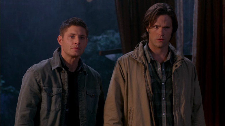 Sam and Dean Winchester looking pensive on Supernatural