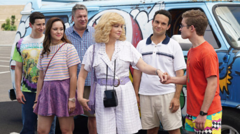 The Goldberg family exiting van