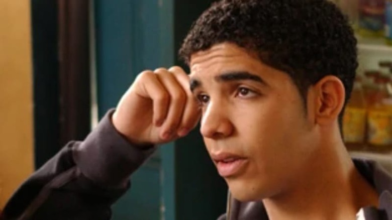 Drake with head on hand in Degrassi: The Next Generation