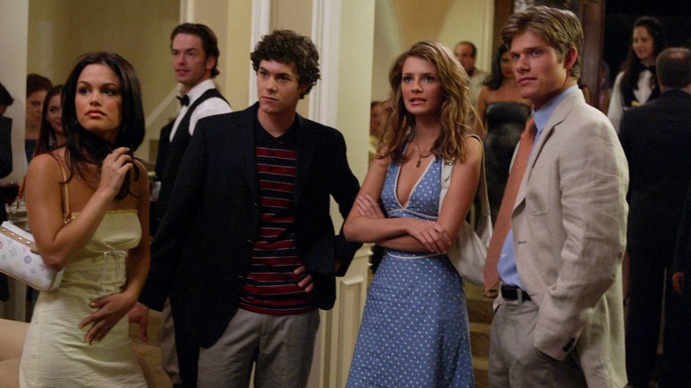 The O.C. cast stand at a party looking surprised