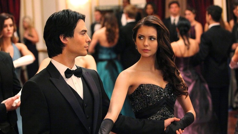 The Vampire Diaries leads look at each other suspiciously in formalwear