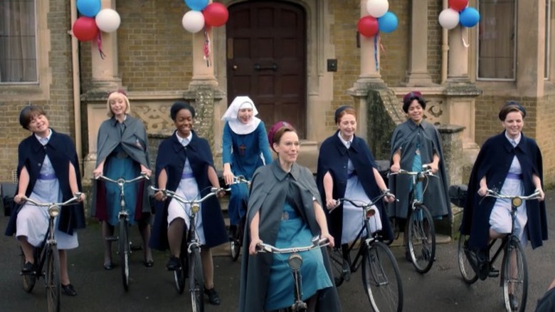 A line of women on bicycles