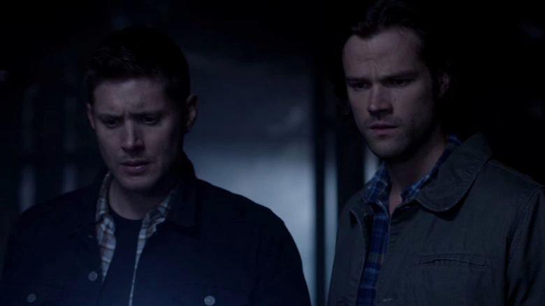 Jared Padalecki and Jensen Ackles as Sam and Dean Winchester looking broody on Supernatural