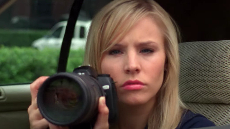 Veronica Mars with a long lens camera