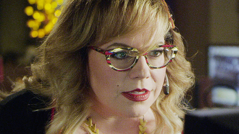 Criminal Minds Kirsten Vangsness talks into an earpiece