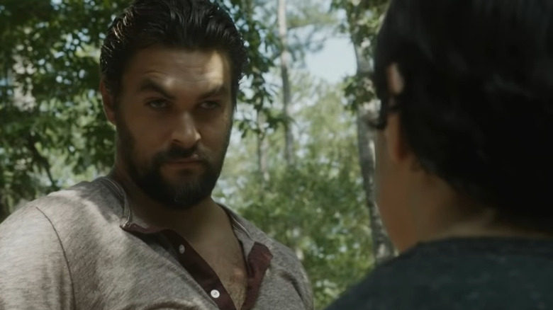 Jason Momoa staring at a kid