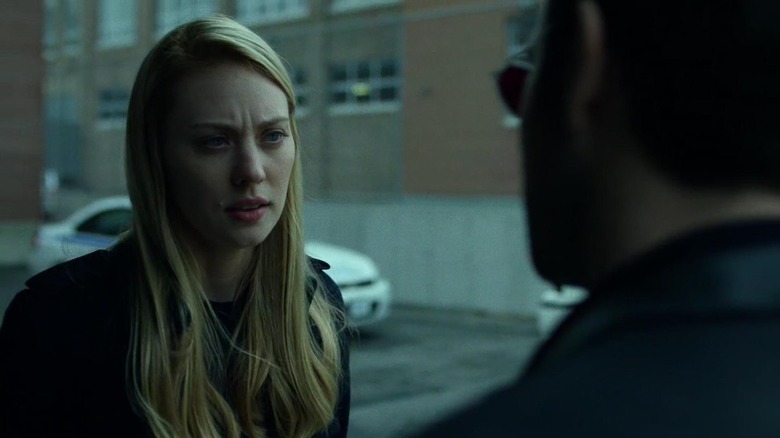 Karen Page in a tense conversation