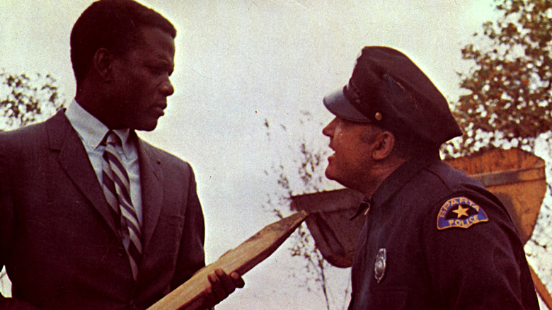 Rod Steiger yells at Sidney Poitier in In the Heat of the Night